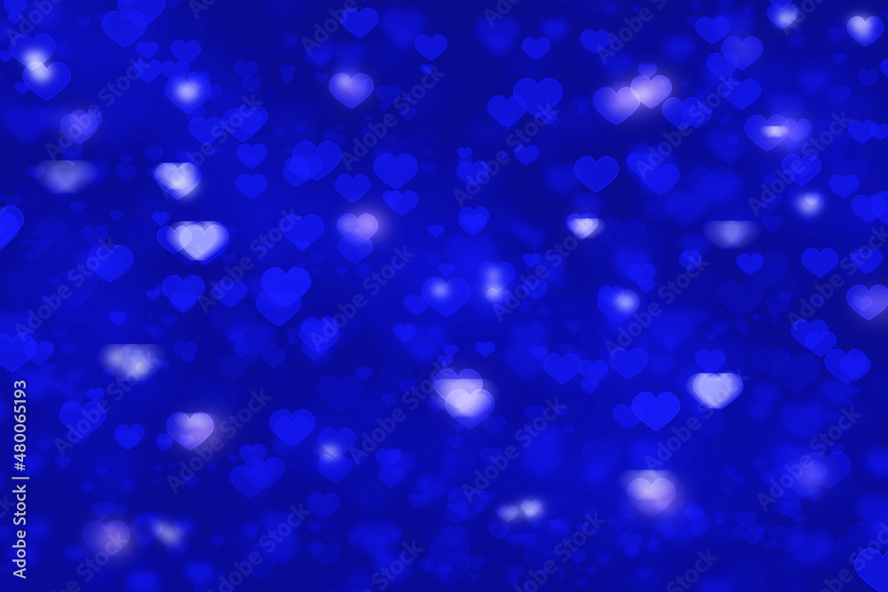 Heart shape bokeh blue background for valentines day greeting card or wallpaper