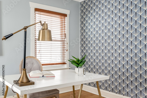 Vintage Home Office with Gold Desk Lamp and Bold Geometric Wallpaper