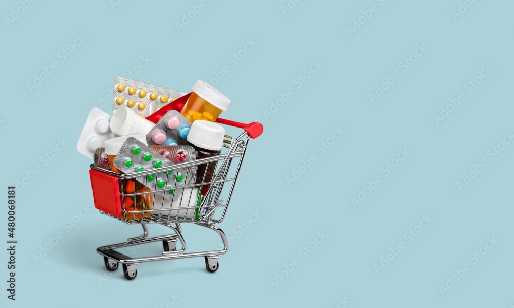 A supermarket trolley full of blister pills, home delivery of medicines. - obrazy, fototapety, plakaty 