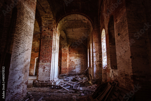 Interior of old abandoned red brick orthodox church