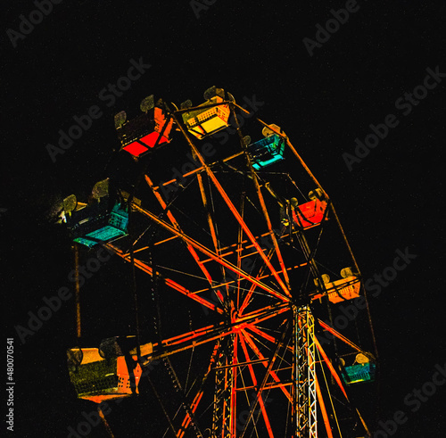 Ferris wheel lit up at night on the strip in Geneva-On-The-Lake, Ohio