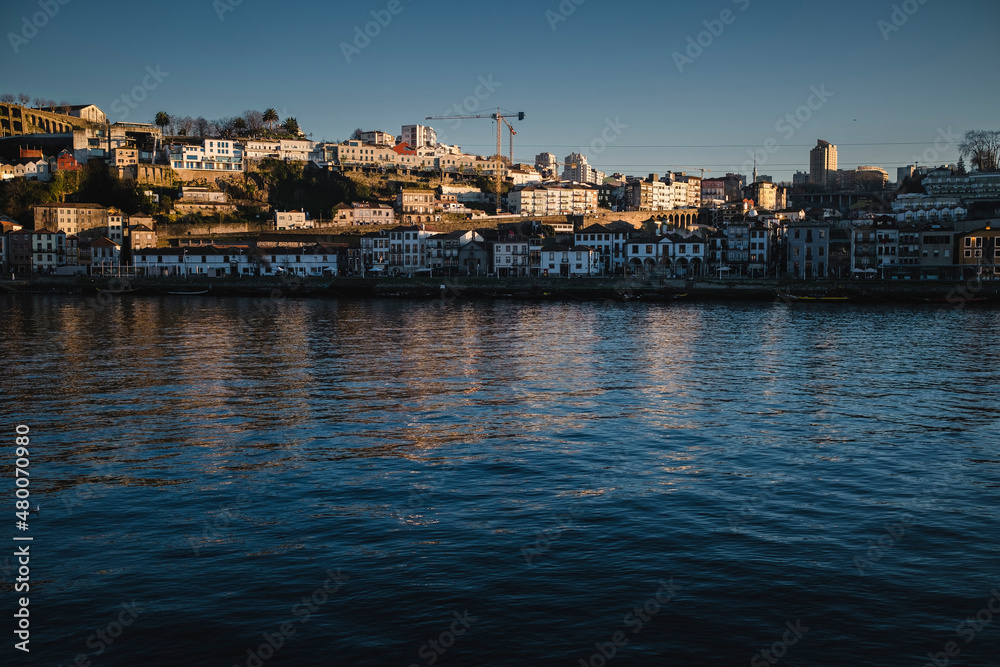 View of the Douro River and Vila Nova de Gaia banks in the center of the Porto, Portugal.