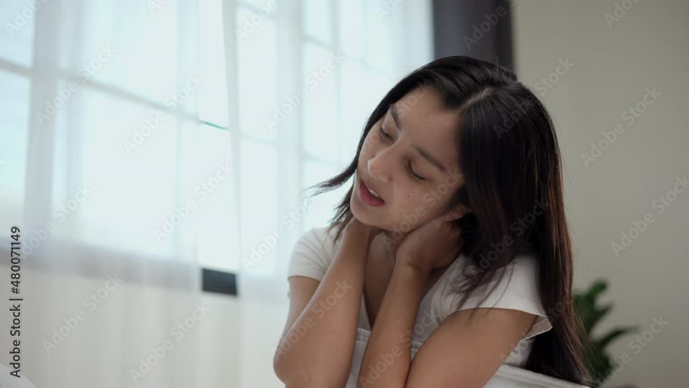 Waking up with a headache. Beautiful woman can't fall asleep, moving restless on bed. Young woman having bad dream, sleep troubles trying can not sleep. Waking up with a headache. Beautiful woman can't fall asleep, moving restless on bed. Young woman having bad dream, sleep troubles trying can not sleep.