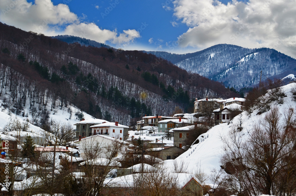 milia village in metsovo city snow in winter season greek tourist resort in ioannina perfecture greece 