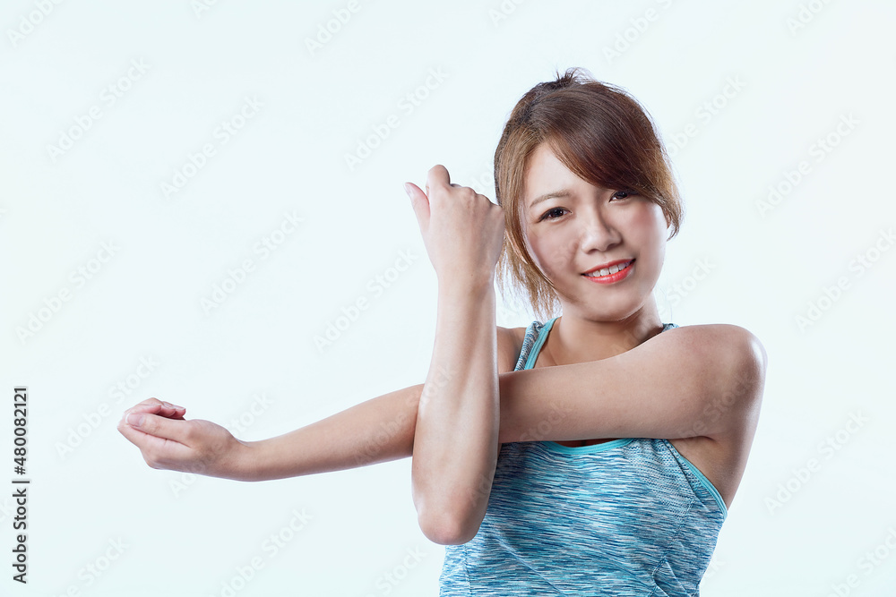Young Asian girl stretch her arm. Concept of warm up exercise. Young Asian girl stretch her arm. Concept of warm up exercise.