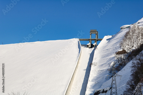 The dam covered with snow