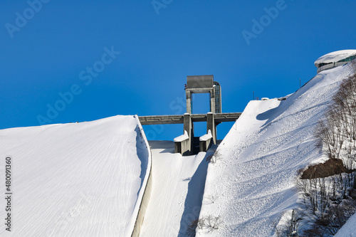 The dam covered with snow