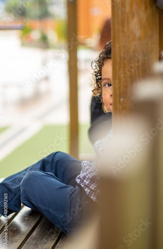 Cute little boy playing happily in the park