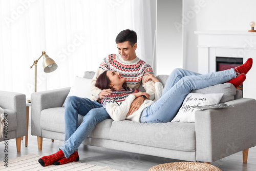Happy young couple wearing ...