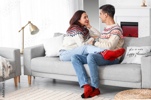 Happy young couple wearing ...