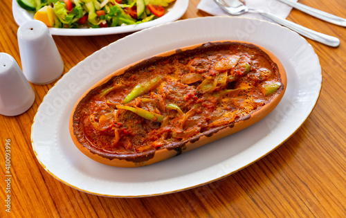 Izmir kofte - Turkish traditional meatball with chickpeas and tomato sauce