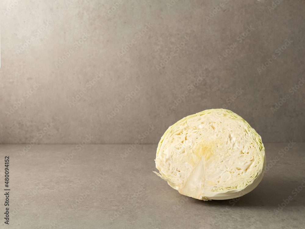 cut cabbage on a gray background cut cabbage on a gray background