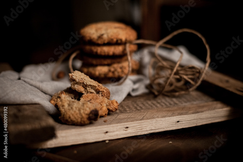 Morning cookies with almonds on the wood board. Selective focus