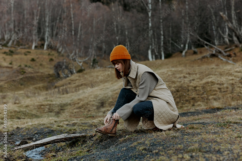 portrait of a woman in autumn clothes nature trees travel relaxation