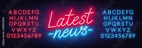 Latest News neon sign on brick wall background