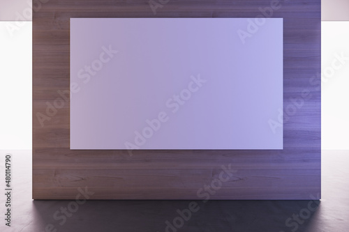 Abstract spacious concrete interior with daylight and empty white mock up poster on wooden wall panel. Gallery and nobody concept. 3D Rendering.