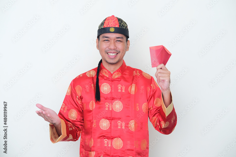 Adult Asian man wearing Chinese costume called Adult Asian man wearing Chinese costume called