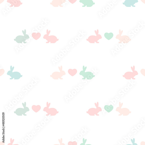 Seamless abstract pattern with Easter rabbits and hearts of different pastel colors. White background. Decorative holiday wallpaper, good for printing