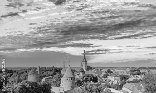 Panoramic aerial view of Tallinn at sunset from city tower, Estonia.