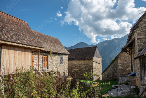 Summer in the stables of Orias in Carnia. Ancient constructions photo