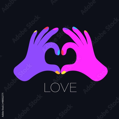 Fingers making heart shaped gesture.