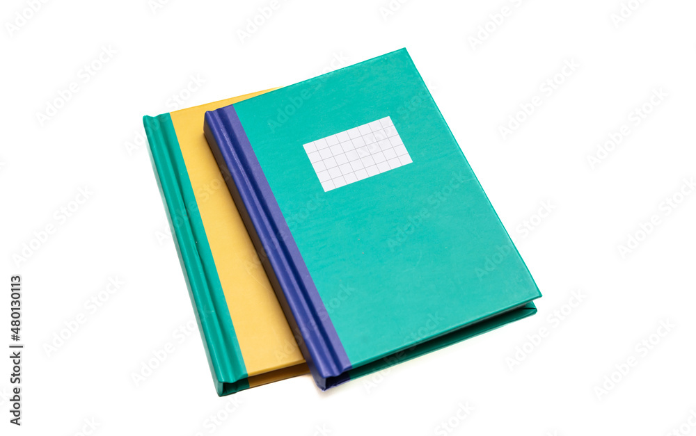 Notebook isolated on white background. Notepad, yellow and green color cover, School supply Notebook isolated on white background. Notepad, yellow and green color cover, School supply