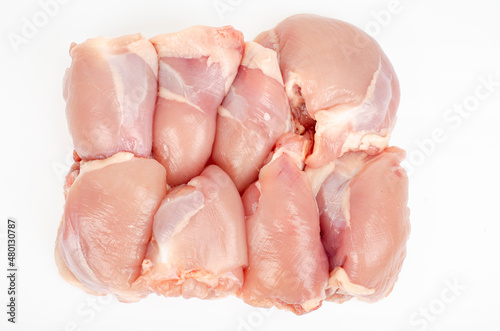 Pieces of chicken thigh meat without skin and bone. Studio Photo