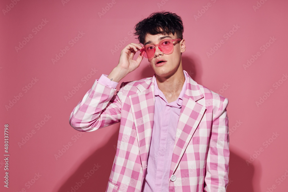 Obraz premium Photo of romantic young boyfriend self confidence pink plaid blazer fashion posing model studio