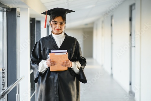 portrait of indian graduate student
