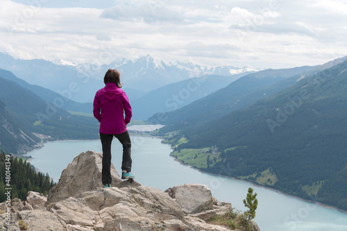 sporty woman distance vantage point lake tyrol