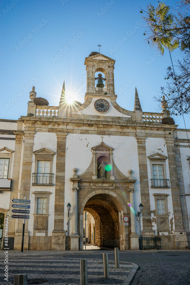 Historic entrance to the old town known as Arco da vila, Faro, Algarve, Portugal