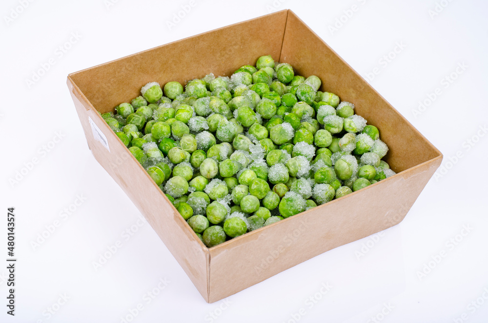Frozen green peas, preservation of vitamins and vegetables. Studio Photo Frozen green peas, preservation of vitamins and vegetables. Studio Photo