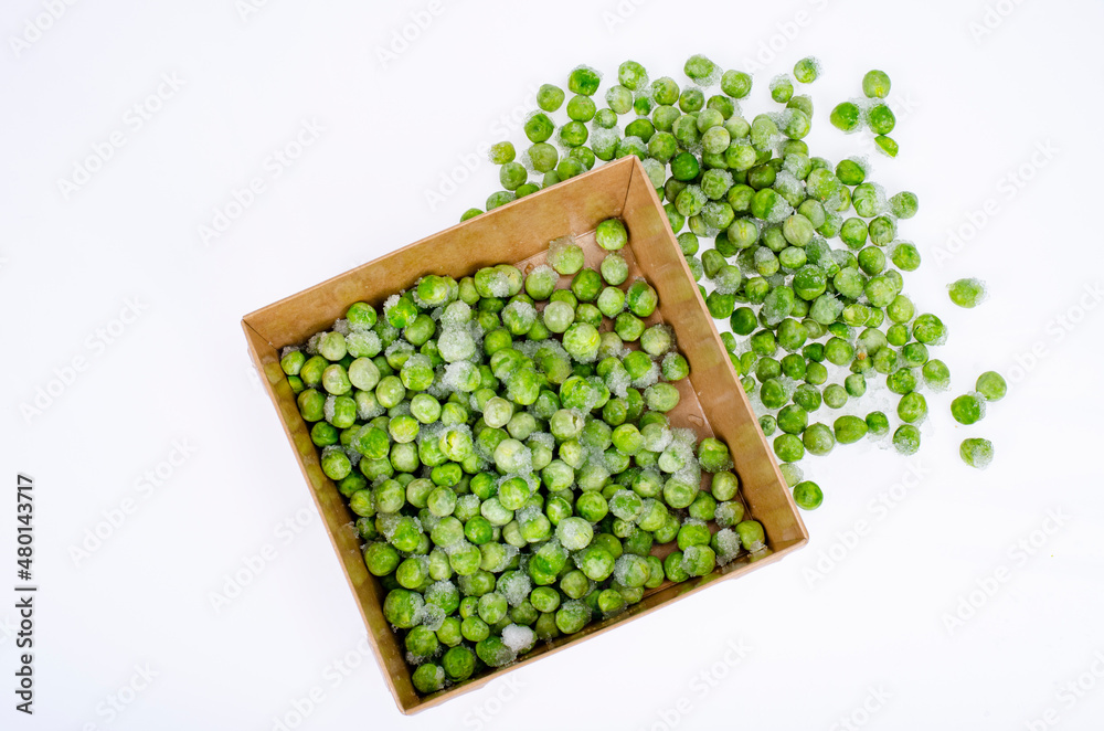 Frozen green peas, preservation of vitamins and vegetables. Studio Photo Frozen green peas, preservation of vitamins and vegetables. Studio Photo