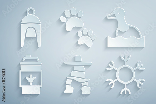 Set Inukshuk, Flying duck, Coffee cup to go, Snowflake, Paw print and Winter hat icon. Vector