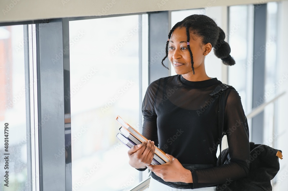 portrait of happy female african american college student portrait of happy female african american college student