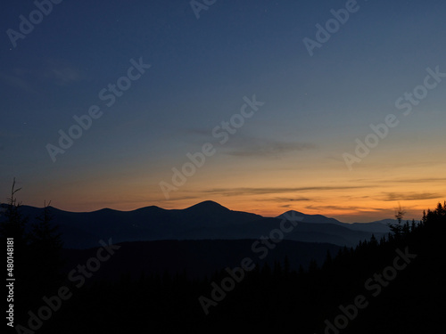 summer sunset at charphatian mountains with view on Chornogora