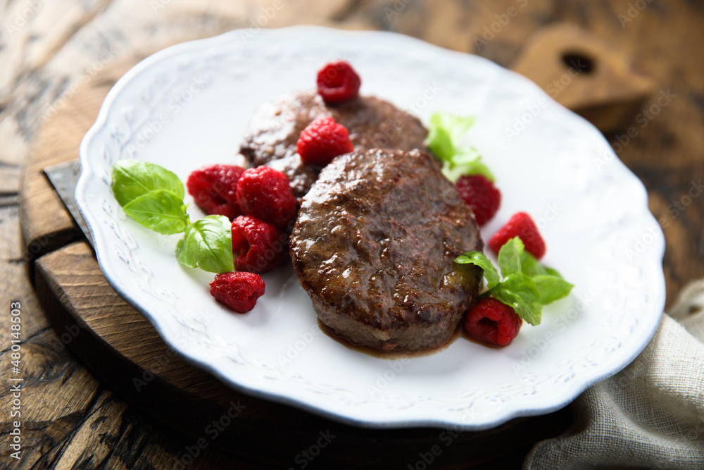 Homemade meat chops with raspberry and mint Homemade meat chops with raspberry and mint
