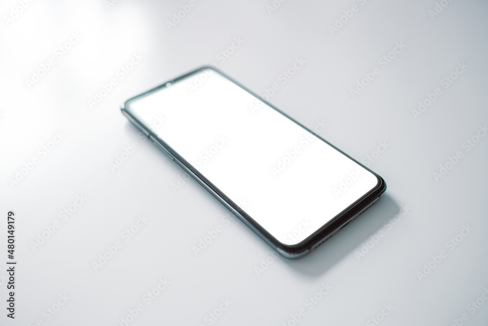 Smartphone with copy space on the table. Cellphone display mock up. Top view Smartphone with copy space on the table. Cellphone display mock up. Top view