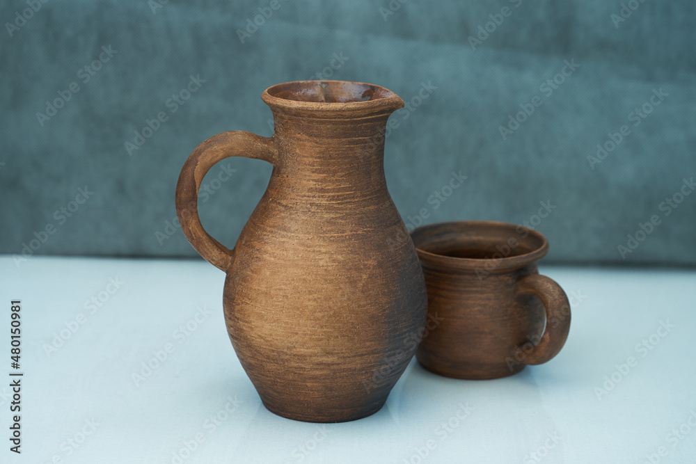 Ceramics, a ceramic product made with your own hands, made on a potter's wheel, a jug, a mug, clay. Ceramics, a ceramic product made with your own hands, made on a potter's wheel, a jug, a mug, clay.