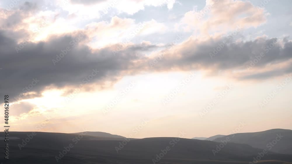 Silhouettes of mountains against the background of the evening sky. Caucasian State Natural Biosphere Reserve named after Kh.G. Shaposhnikov. Lago-Naki plateau. Russia. Silhouettes of mountains against the background of the evening sky. Caucasian State Natural Biosphere Reserve named after Kh.G. Shaposhnikov. Lago-Naki plateau. Russia.