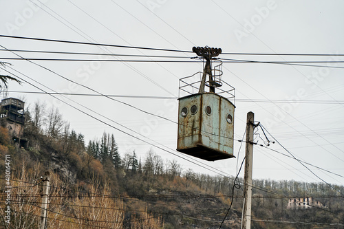 Old rusty cable car trolley in an industrial mining town photo