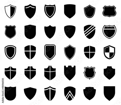 Obraz na płótnie Set of black icons shields w salonie