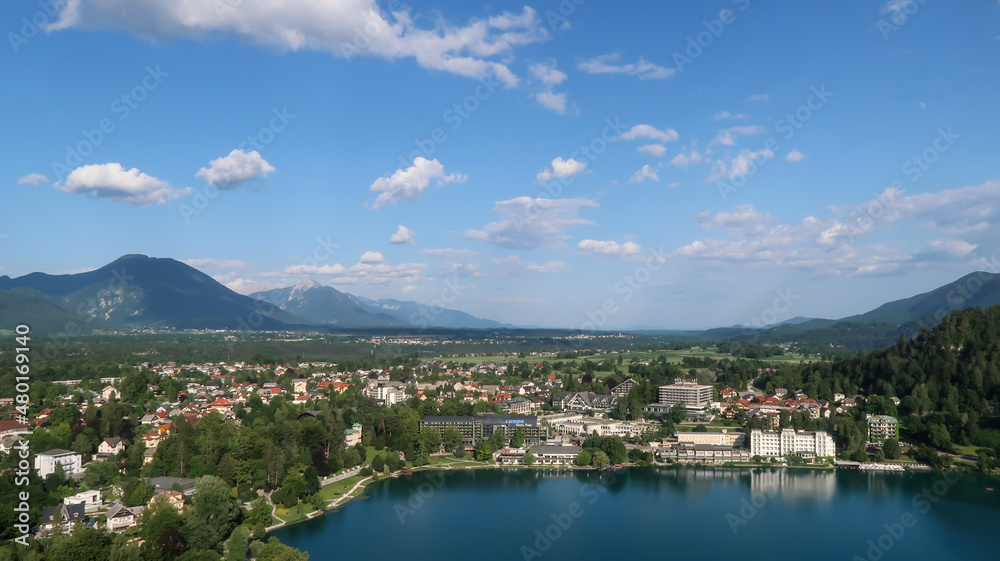 Panoramic view to the Bled town and lake during a sunny day