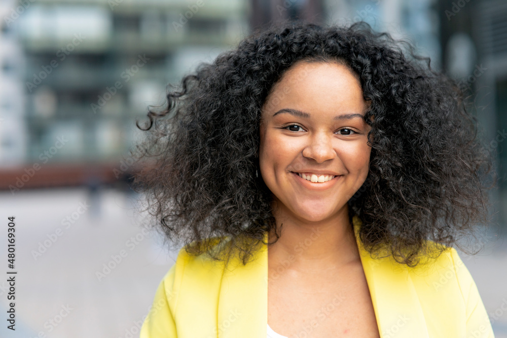 Portrait of a beautiful and happy young Black woman. Black girl, African American smiling, laughing. Portrait of a beautiful and happy young Black woman. Black girl, African American smiling, laughing.