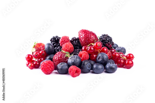Ripe berries mixed assortment on white background. Summer berries sweet background.