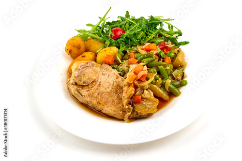 Stewed meat with vegetables and baked potatoes, hotpot, isolated on white background.