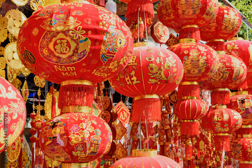 Closeup view of traditional red lanterns at New Year market © efired