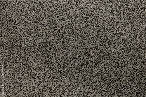 Dark carpet rough texture surface with abstract background black pattern