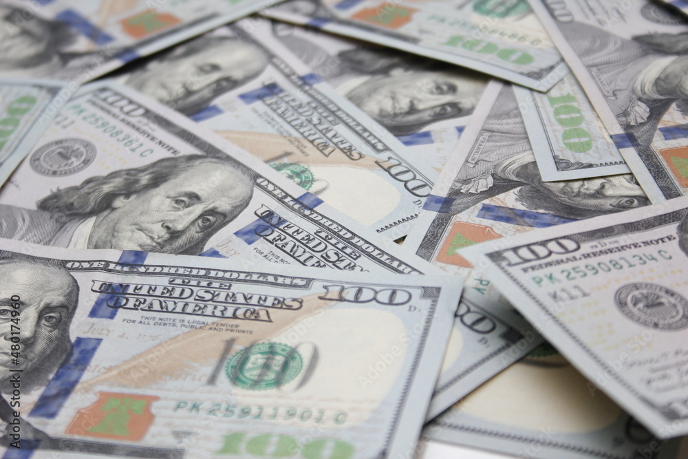 100 dollar US banknotes placed on a white background. 100 dollar US banknotes placed on a white background.