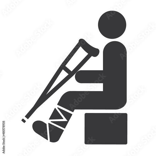 injury vector icon - patient with plaster leg and crutches in a hospital